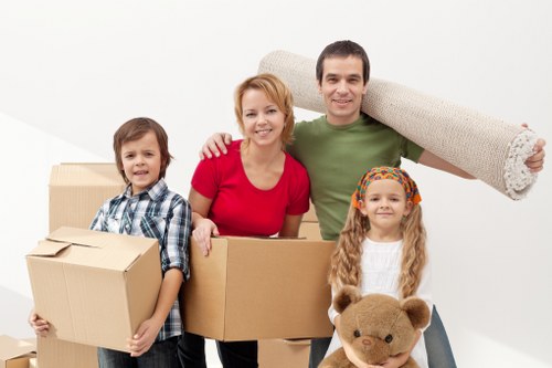 Packed boxes and furniture ready for flat removals in Haringey